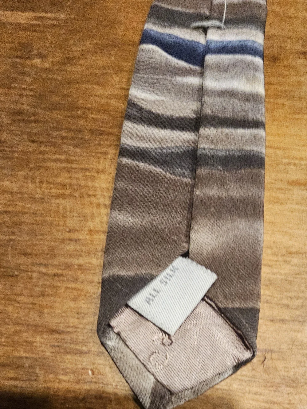 C3, The Pierre Cardin Men's Tie is a high-quality accessory made from 100% silk.